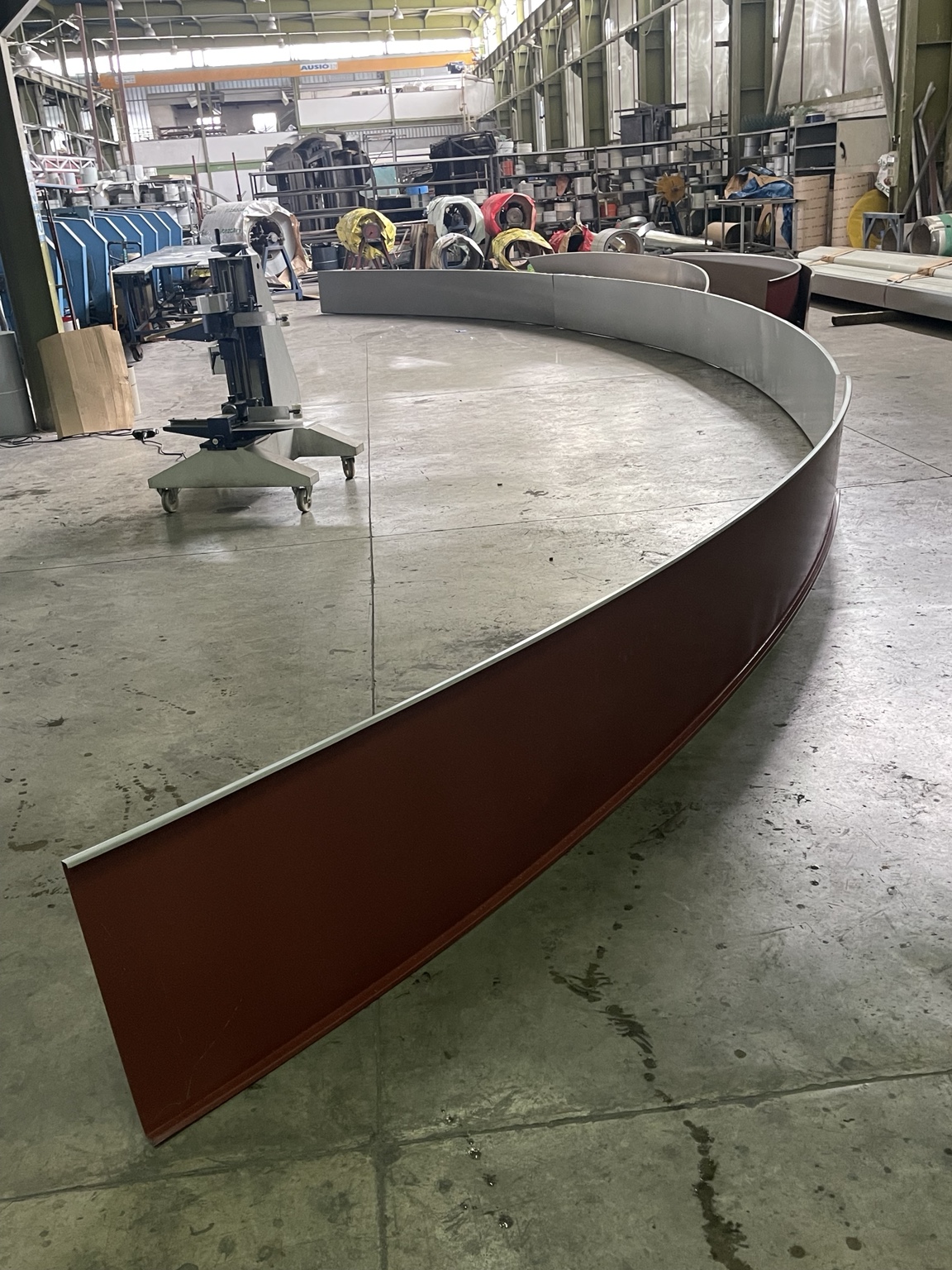 Curved standing seam production working source
